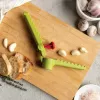 Knoflookpers met handgreep Ototo Design Garligator groen kunststof staal