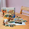 Puzzel Ravensburger 100 stukjes stad 275×195 mm, leeftijd 9+