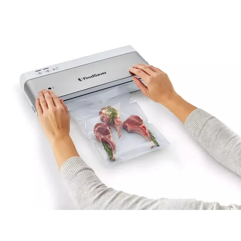 Vacuümmachine FoodSaver VS0100X — draaiknop, inclusief folierol en 4 vacuümzakken, zilver-wit