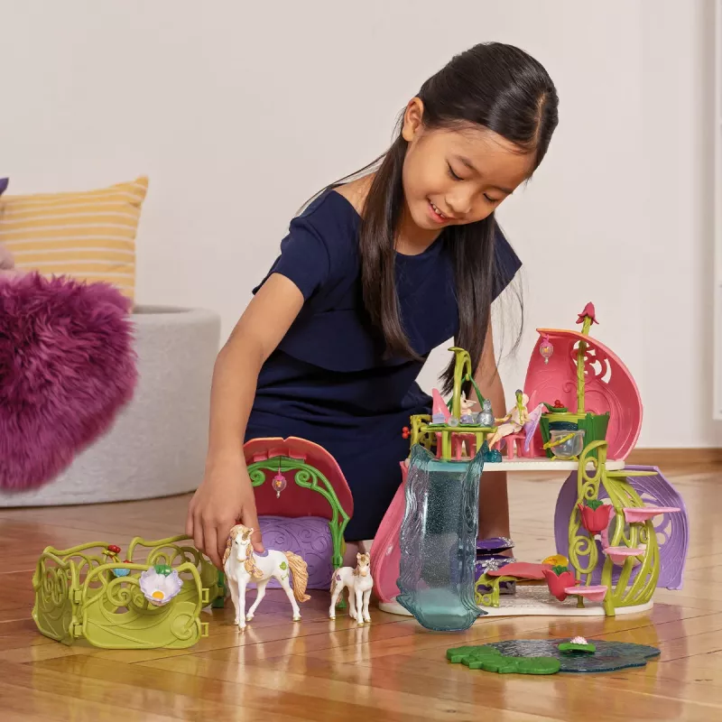 schleich BAYALA Glinsterend bloemenhuis met eenhoorns, meer en stal