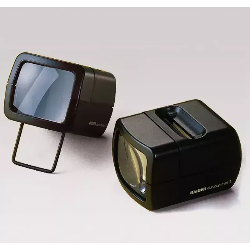 Diaprojector KAISER 2010 — compacte 3x vergroting, 75×105×60 mm, 1,5 V batterij