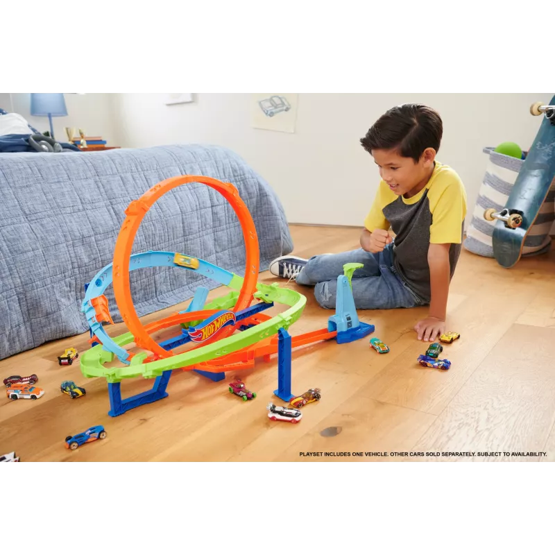 Hot Wheels Action Loop Cyclone Challenge banenset met speelgoedauto op schaal 1:64, eenvoudige opberging